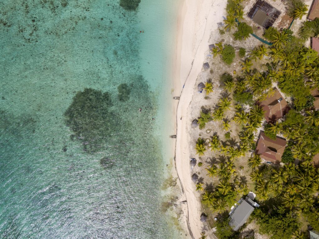 Aerial View Of Beach And Huts in Fiji
