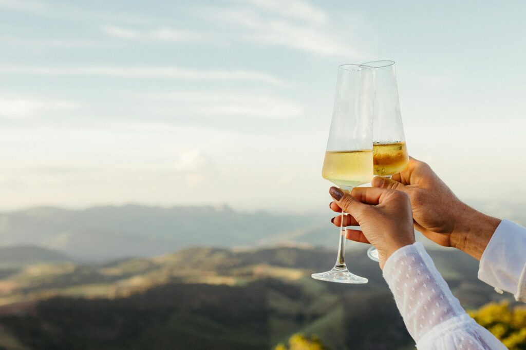 Couple enjoying champagne flutes with beautiful vie