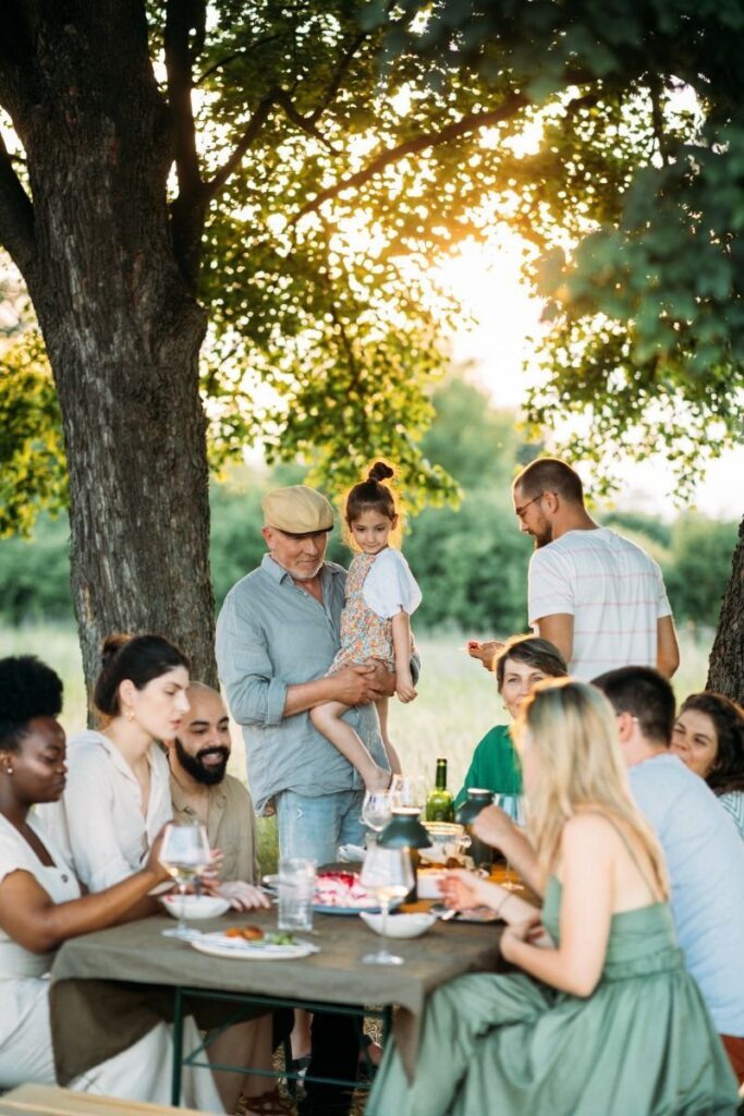 Families dining together outside